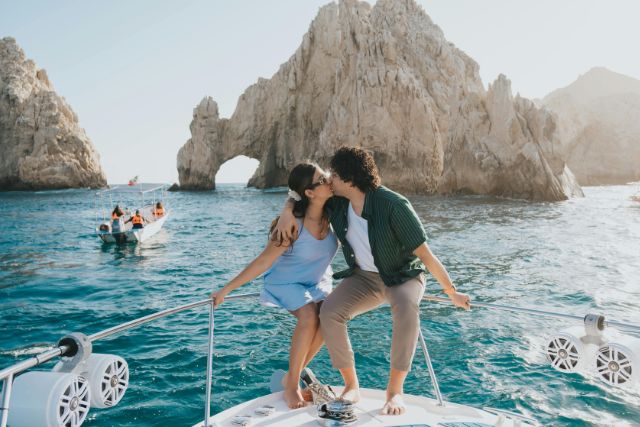 Couple kissing on a boat ride